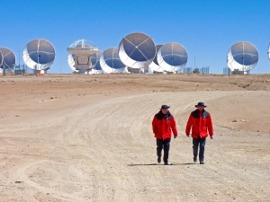 Men in red walk away from ALMA