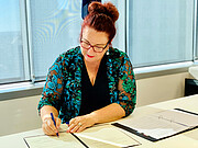 Minister Price signing the ESO-Australia partnership amendment