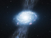Artist’s impression of a young galaxy accreting material