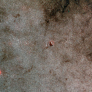 Panoramica dell'ammasso stellare NGC 6520 e della nube oscura Barnard 86