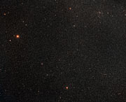 Vue à grand champ du ciel autour de la galaxie ESO 137-001 