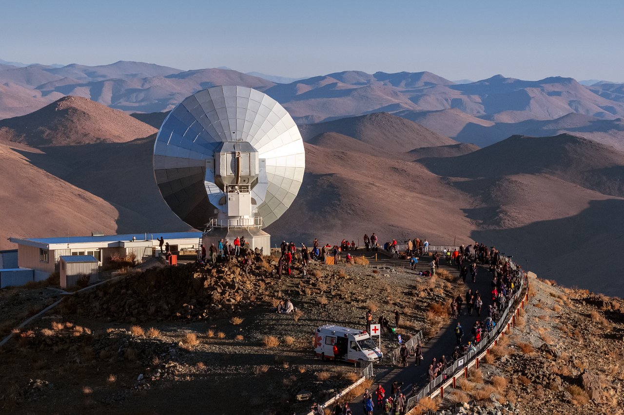 Visitors observe the 2019 solar eclipse from a privileged area near the SEST at La Silla