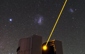 Mounted image 159: Yepun's Laser and the Magellanic Clouds