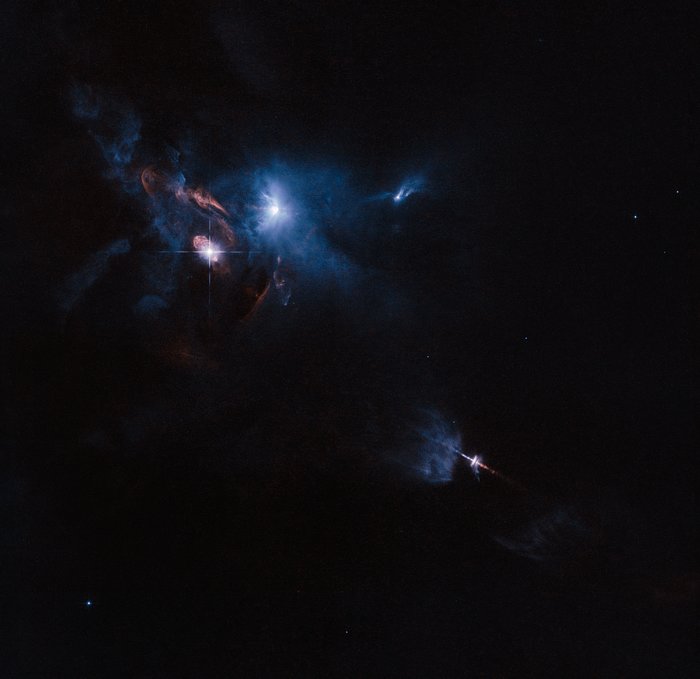 Hubble billede af den unge stjerne HL Tauris omgivelser