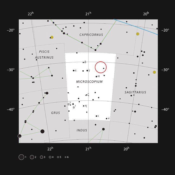 A estrela AU Mic na constelação do Microscópio