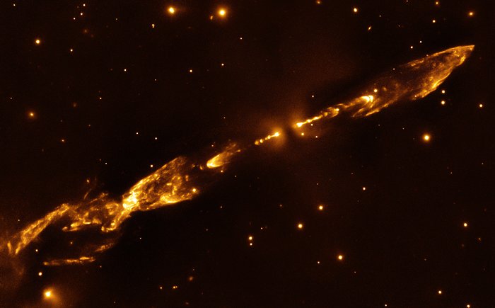 Outbursts from a newborn star