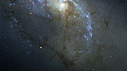 Panning across the ALMA and Hubble views of the Antennae Galaxies (crossfade)