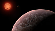 Artist’s impression van de ultrakoele dwergster TRAPPIST-1, gezien vanuit de omgeving van een van zijn planeten