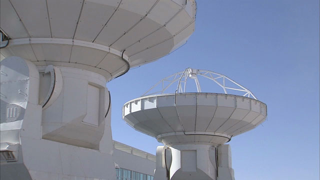 Two ALMA antennas at the OSF