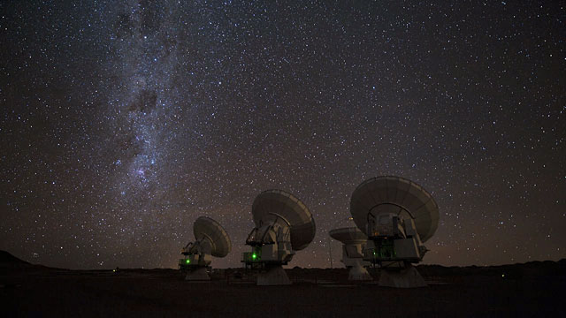 Four ALMA antennas on the Chajnantor pain